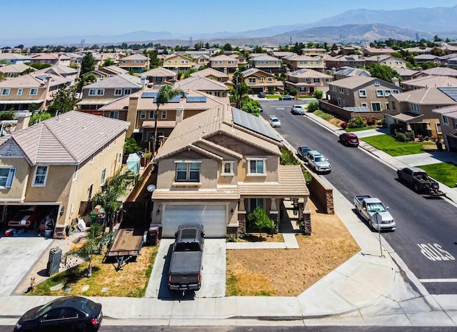 drone / aerial view featuring a mountain view