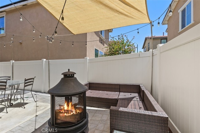 view of patio / terrace with a fireplace