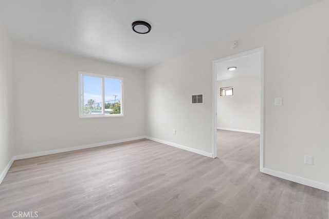 empty room featuring light hardwood / wood-style flooring