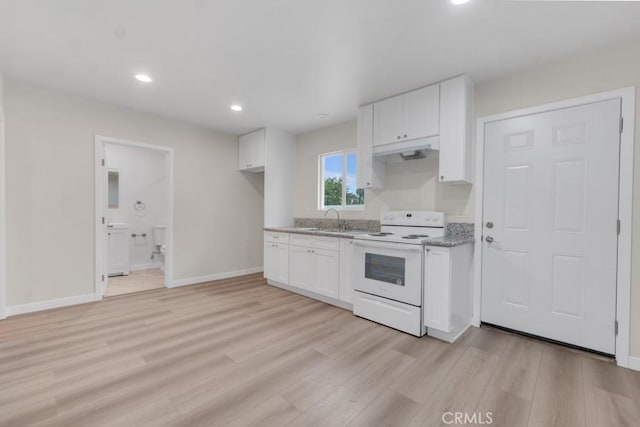 kitchen with white electric range, sink, light stone countertops, light wood-type flooring, and white cabinetry