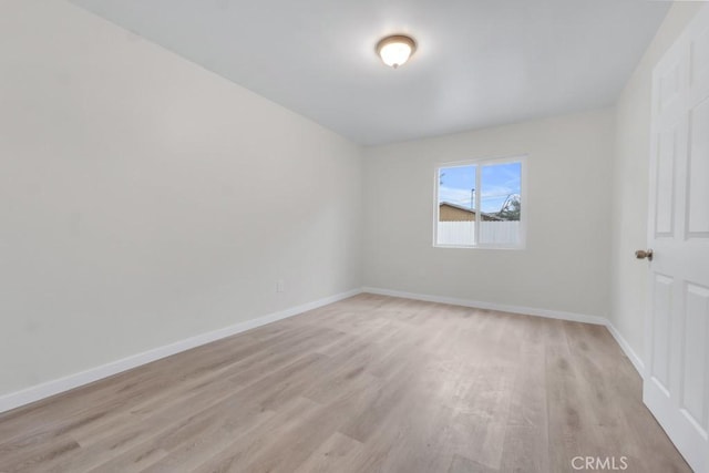 unfurnished room featuring light wood-type flooring