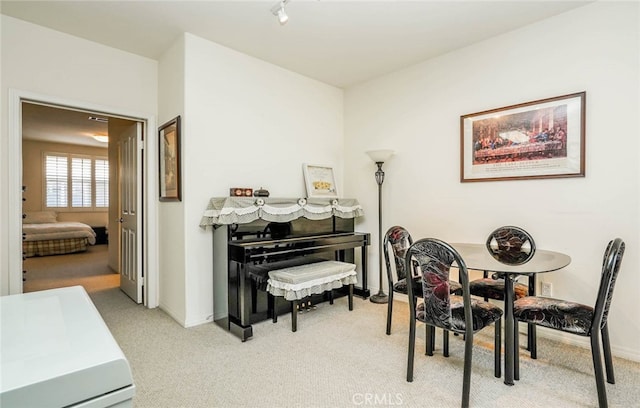 view of carpeted dining room