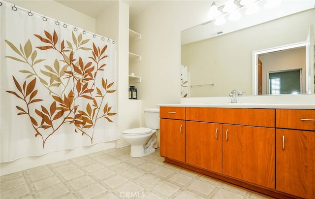 full bathroom featuring vanity, toilet, and shower / bath combo with shower curtain