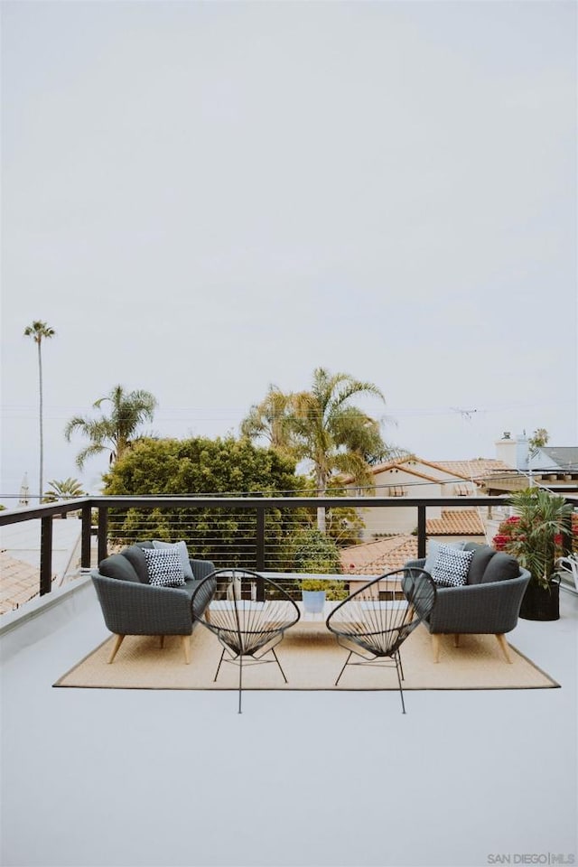 balcony featuring an outdoor living space