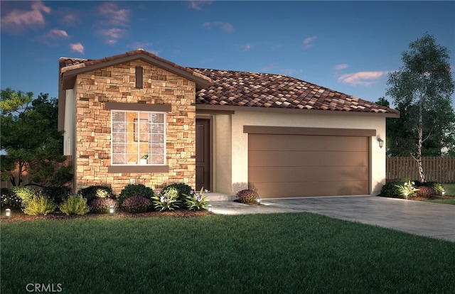 view of front of home featuring a garage and a lawn