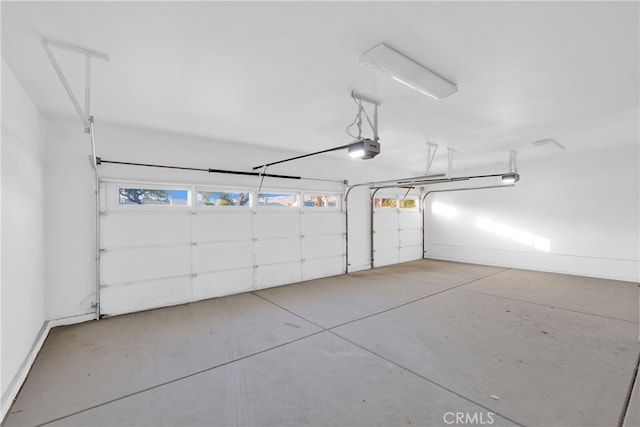 garage featuring a garage door opener