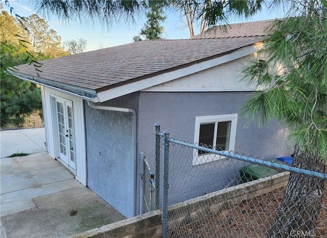 view of home's exterior featuring french doors