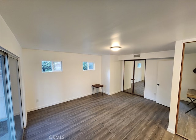 basement with dark wood-type flooring