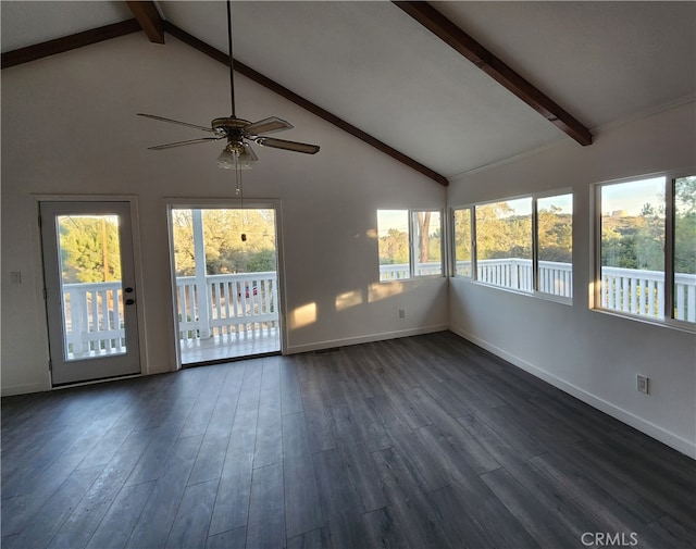 unfurnished sunroom featuring ceiling fan and vaulted ceiling with beams