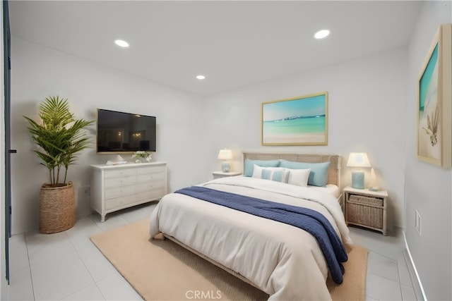 bedroom with light tile patterned floors