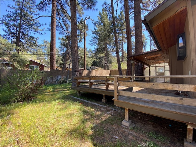 view of yard with a deck