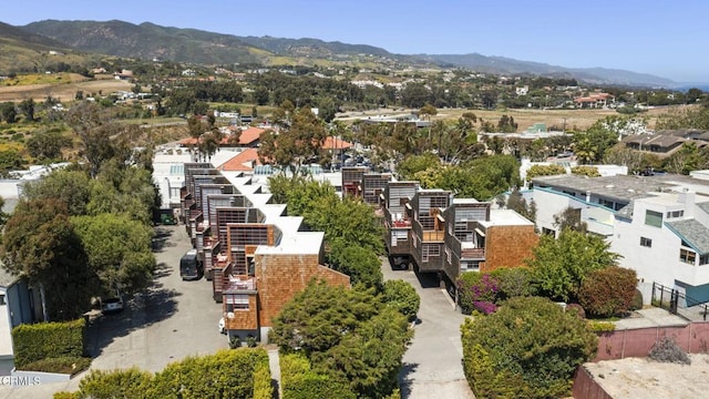 drone / aerial view featuring a mountain view