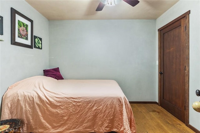 bedroom featuring ceiling fan and light wood-type flooring