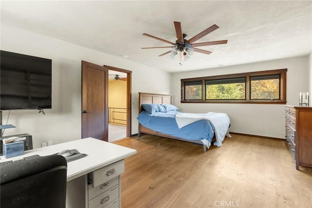 bedroom featuring ceiling fan and light hardwood / wood-style flooring