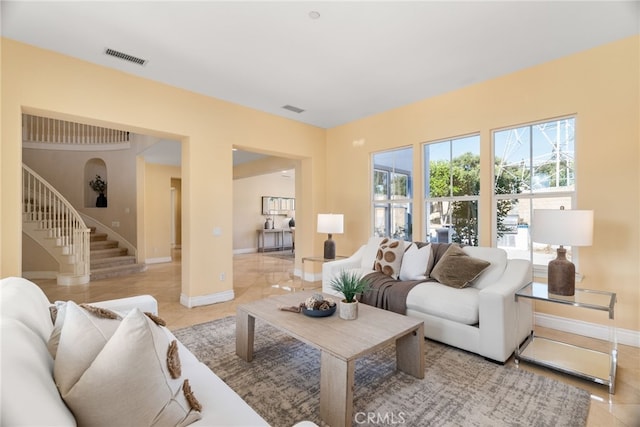 living room featuring light tile patterned floors