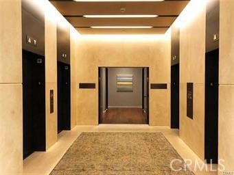 corridor featuring elevator