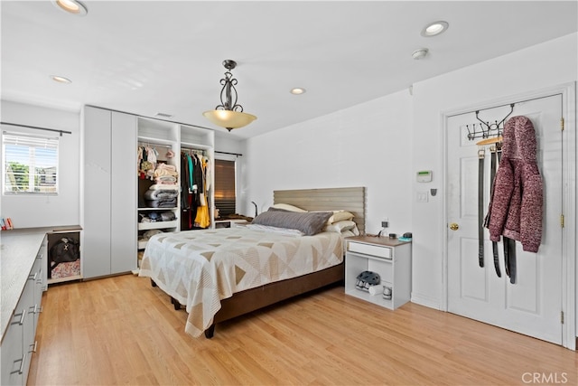 bedroom featuring light hardwood / wood-style flooring