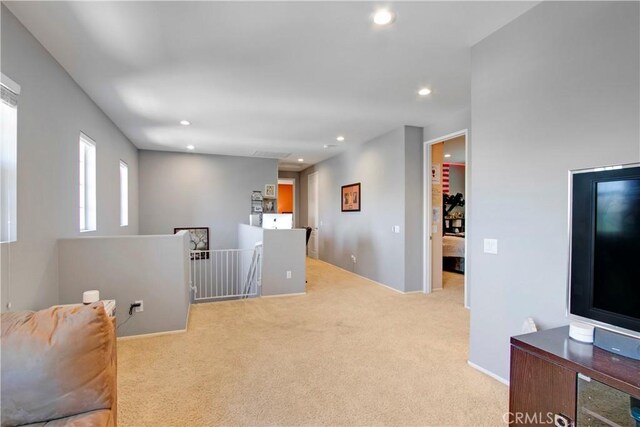 interior space featuring light colored carpet