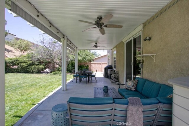 view of patio / terrace with ceiling fan and an outdoor hangout area