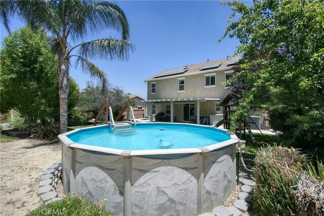 view of pool featuring a pergola