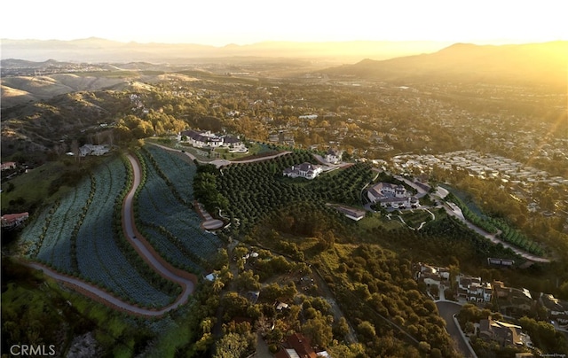 aerial view at dusk with a mountain view