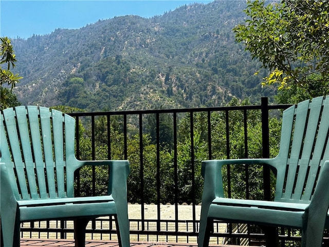 balcony featuring a mountain view