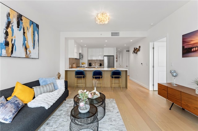 living room featuring light hardwood / wood-style flooring