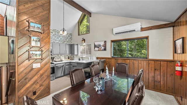 carpeted dining space with beam ceiling, wood walls, a wall mounted AC, and a wealth of natural light