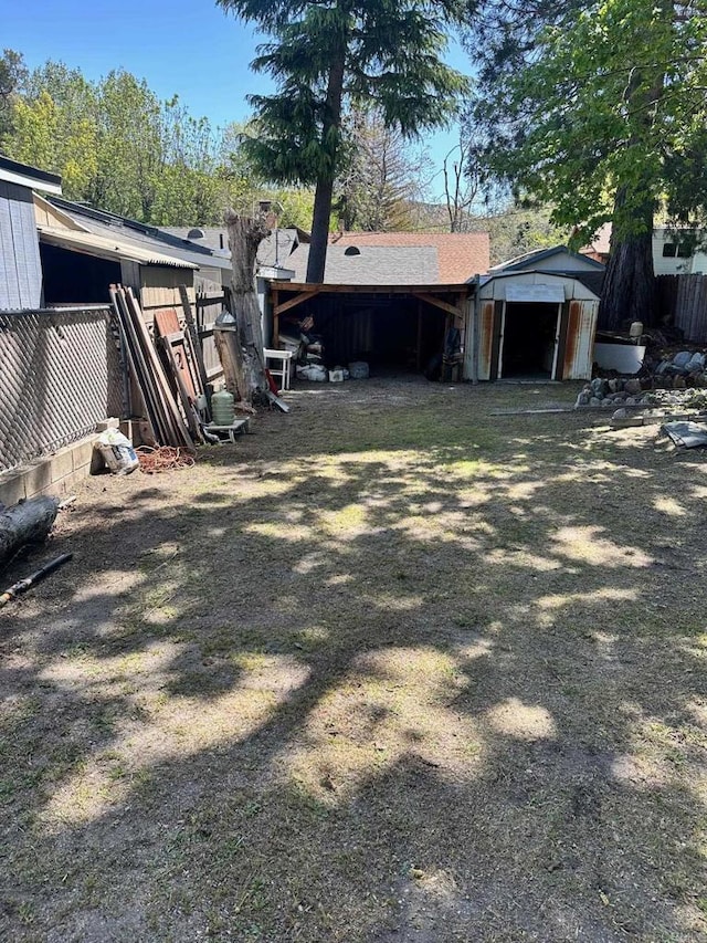 view of yard with a storage shed