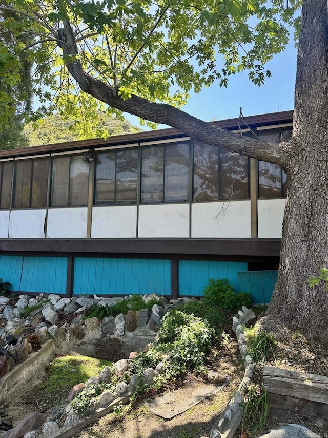 exterior space with a sunroom