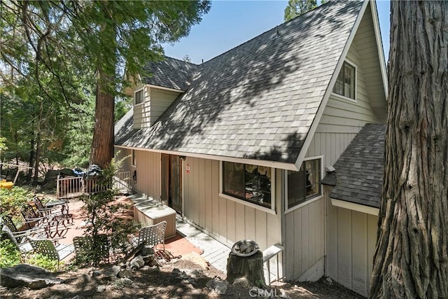 view of property exterior with a patio