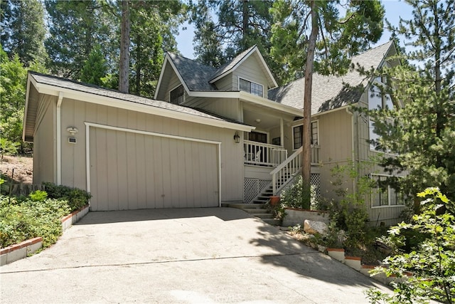 view of front of house with a garage and covered porch