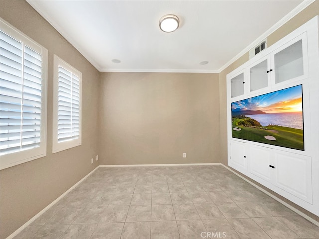 tiled empty room with ornamental molding