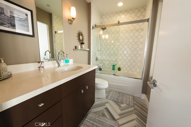 full bathroom with toilet, enclosed tub / shower combo, vanity, and tile patterned flooring