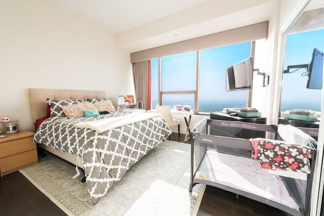 bedroom featuring wood finished floors