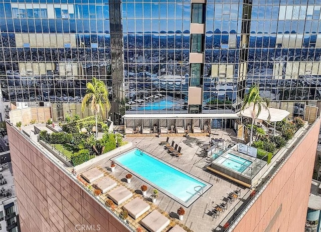 view of swimming pool with a patio area