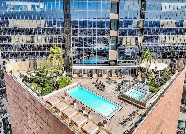 community pool with a patio