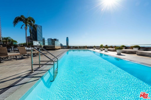 community pool with a patio
