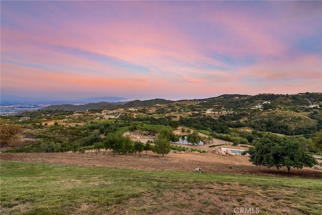 property view of mountains featuring a water view