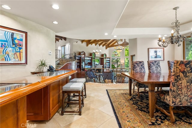 dining space featuring beam ceiling, light tile patterned floors, and a notable chandelier