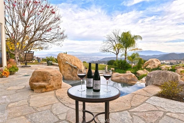 view of patio featuring a mountain view