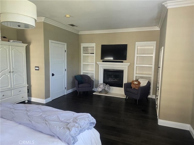 bedroom featuring dark wood-style floors, a fireplace, visible vents, ornamental molding, and baseboards