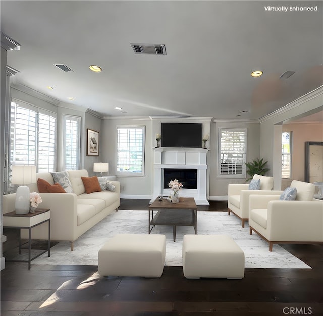 living room featuring wood finished floors, visible vents, and crown molding