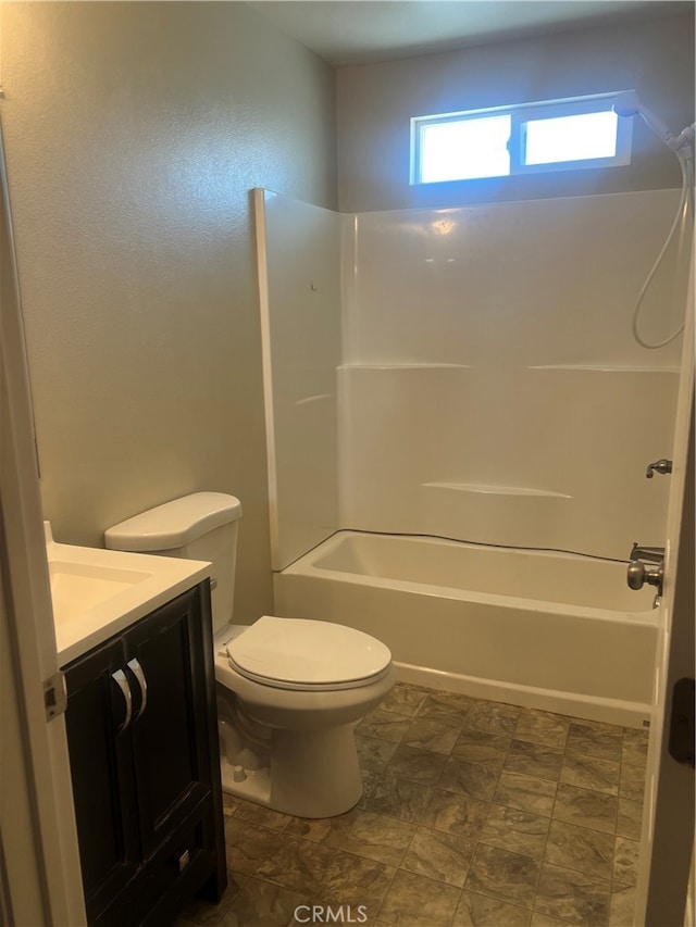 full bathroom featuring vanity, shower / bathing tub combination, and toilet