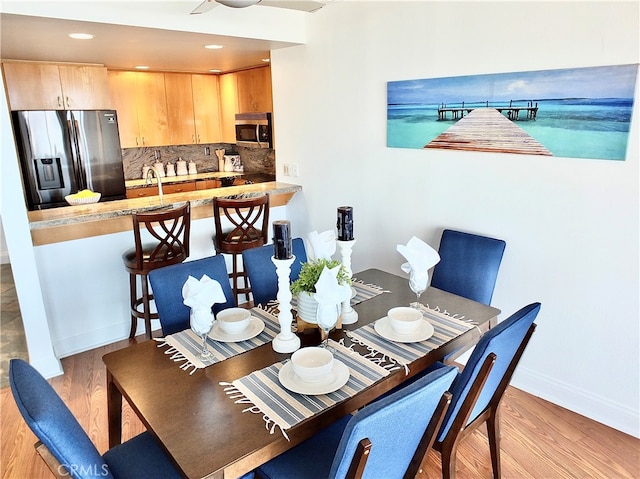 dining area featuring light hardwood / wood-style flooring