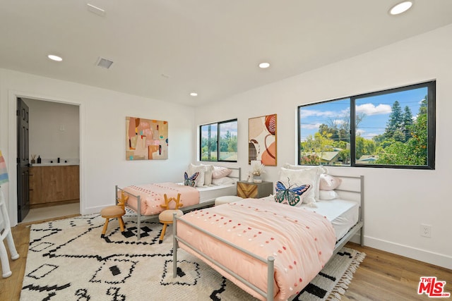 bedroom featuring light hardwood / wood-style flooring