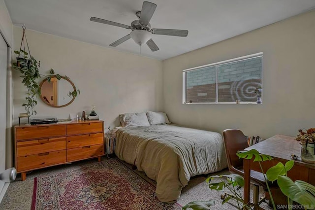 carpeted bedroom featuring ceiling fan