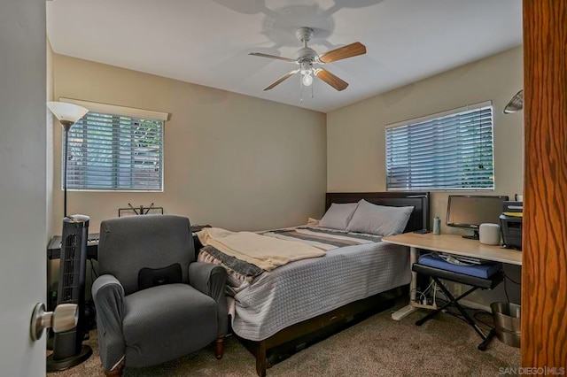 bedroom with multiple windows, carpet flooring, and ceiling fan