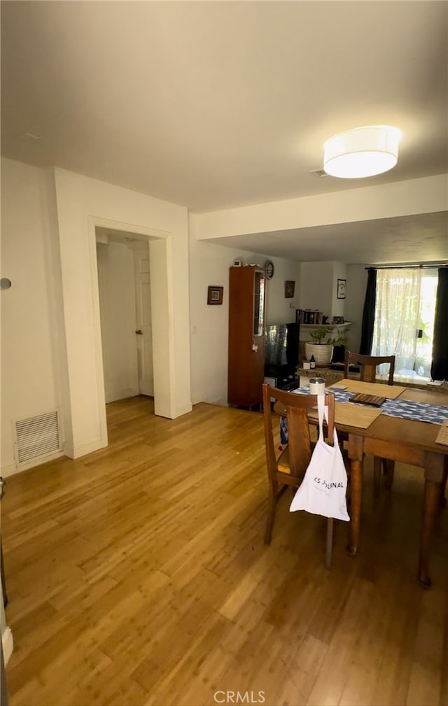 dining area featuring hardwood / wood-style flooring