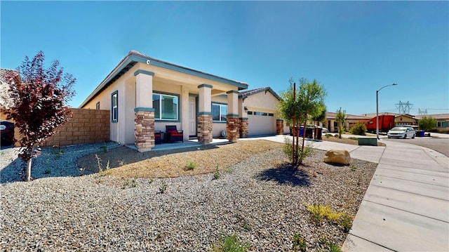 view of front of home with a garage